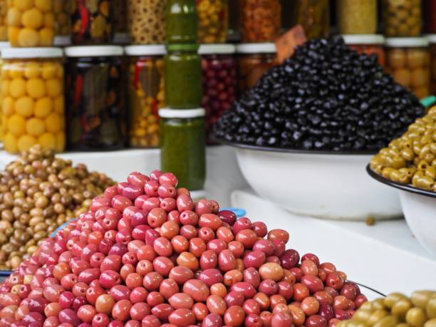 istock Close up olives in a market 669184208