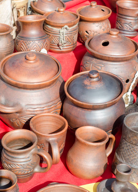 istock Several types of clay pottery pots at the fair 669187376