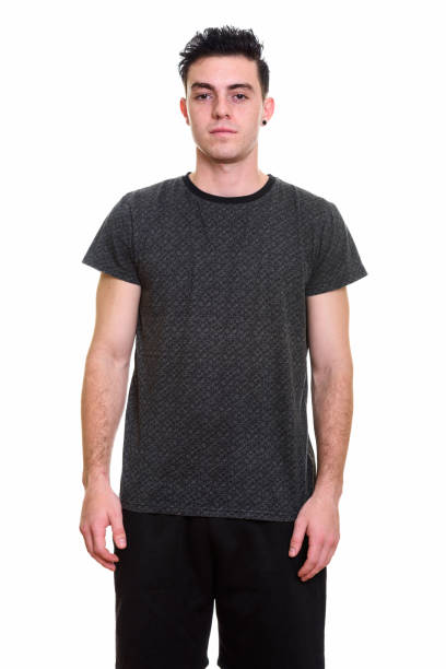 istock Studio shot of young man standing against white background 669187520