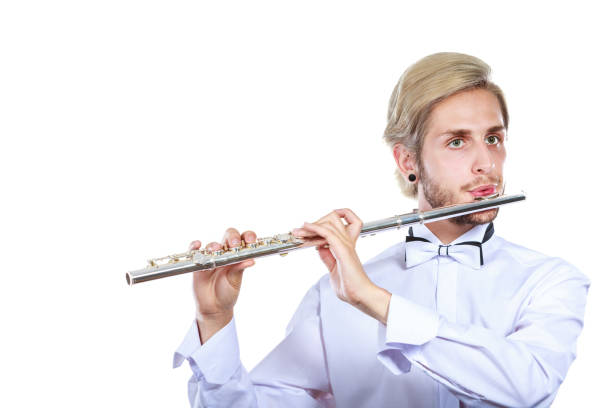 istock Male flutist playing his flute 669188020