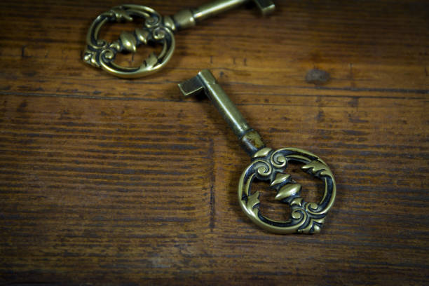 istock Old keys vintage on wooden background 669193830