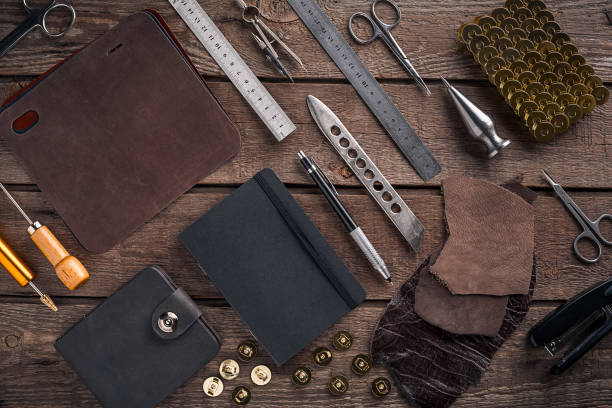 istock Leather products. Work place craftsman in a workshop. Top view 669196686