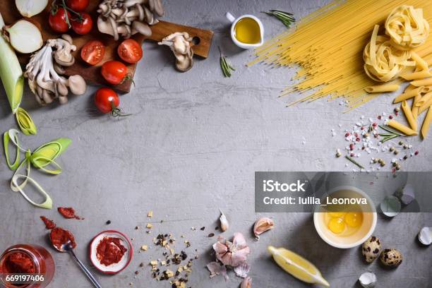 Pasta Asortment With Veggie Ingredients Italian Ciusine Feast Food Frame Stock Photo - Download Image Now