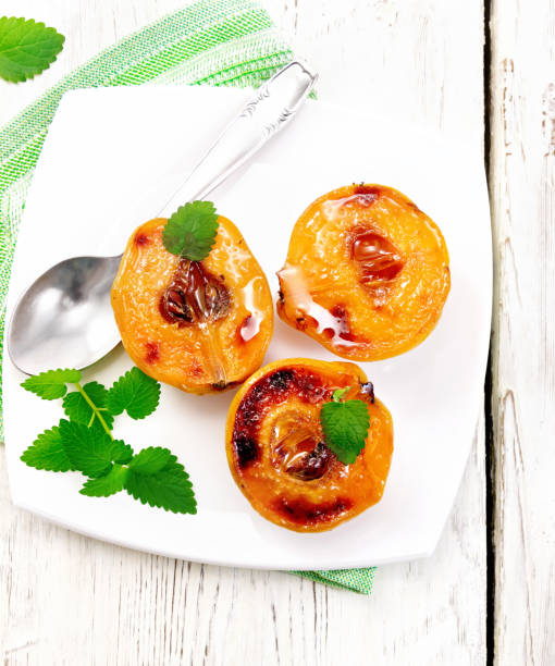 istock Quince baked with mint in plate on board top 669200316