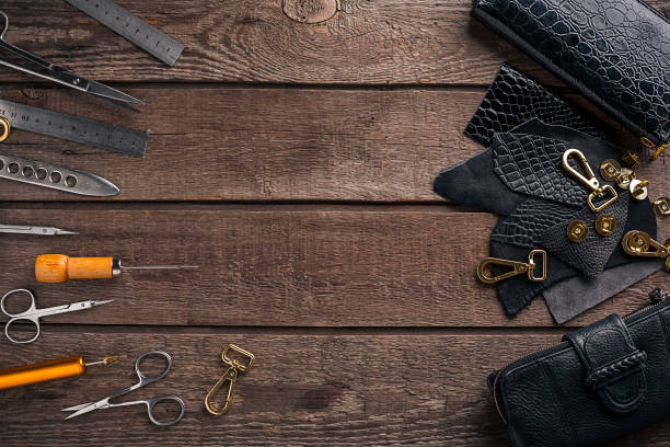 istock Leather products. Work place craftsman in a workshop. Top view 669200324