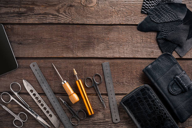 istock Leather products. Work place craftsman in a workshop. Top view 669200444