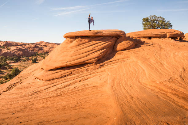 istock Girl stretches her legs on the Saucers 669206848