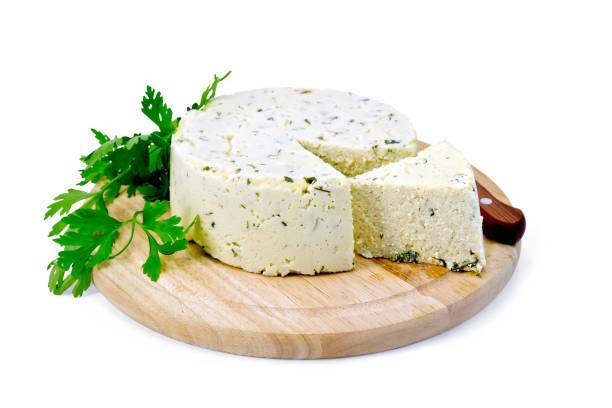 istock Cheese homemade with parsley on round board 669207212