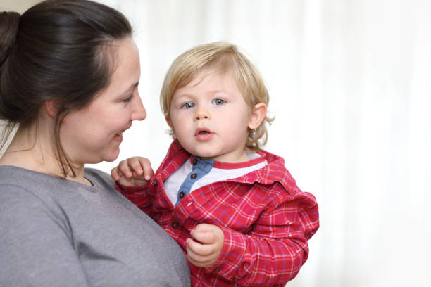 istock Happy Blonde Boy And Mother 669216656