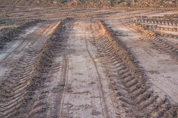 istock Agricultural field on which drove heavy vehicles. 669229668