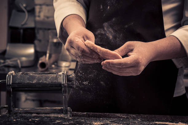 The chef makes fresh pasta from scratch