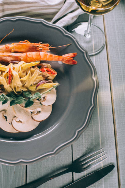 istock Noodles with shrimp and mushrooms. Spaghetti 669244220