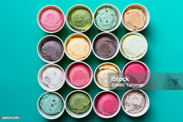 Top View Ice Cream Flavors In Cup On Green Background Stock Photo - Download Image Now