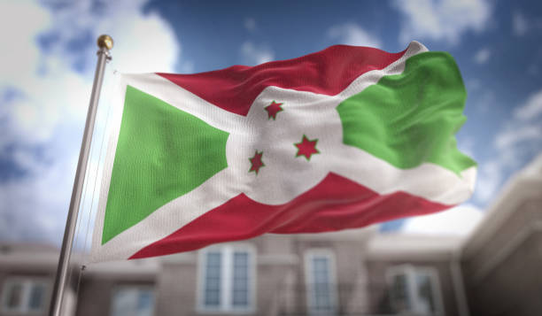 istock Burundi Flag 3D Rendering on Blue Sky Building Background 669247040