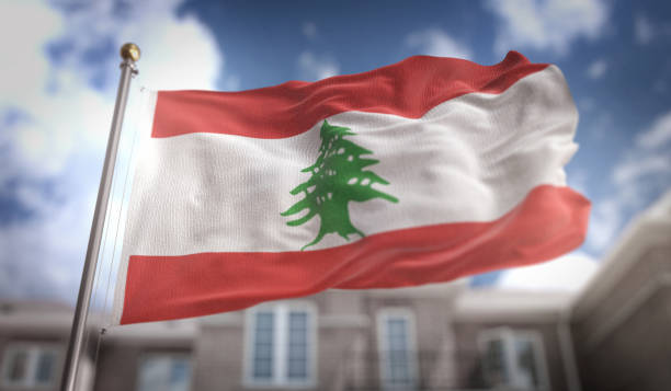 istock Lebanon Flag 3D Rendering on Blue Sky Building Background 669250966