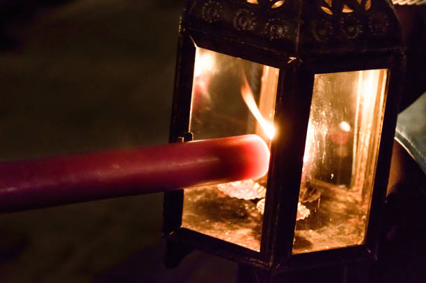 istock Lighting a candle in a Holy Week event 669251022