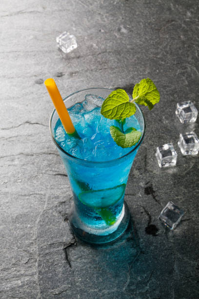 istock classic cocktail bule drink with lime and salt on stone. 669253790