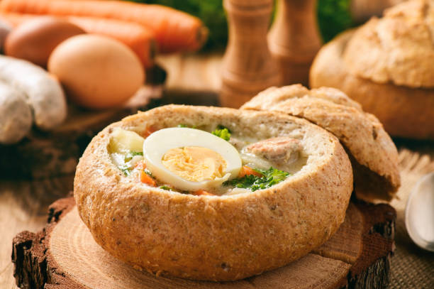 istock Traditional polish  soup - zurek, served in bread loaf. 669254774