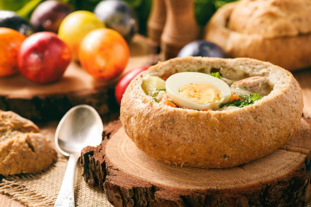 istock Traditional polish easter soup - zurek, served in bread loaf. 669256828