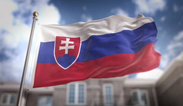 istock Slovakia Flag 3D Rendering on Blue Sky Building Background 669256906