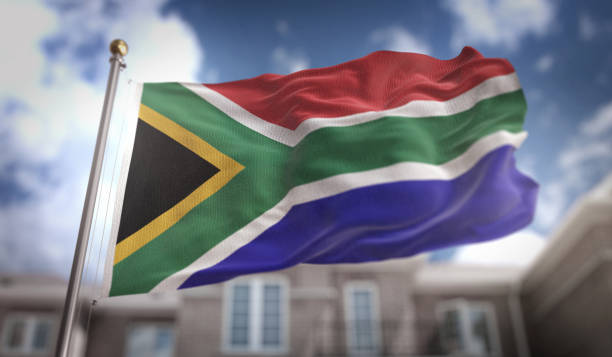 istock South Africa Flag 3D Rendering on Blue Sky Building Background 669256988