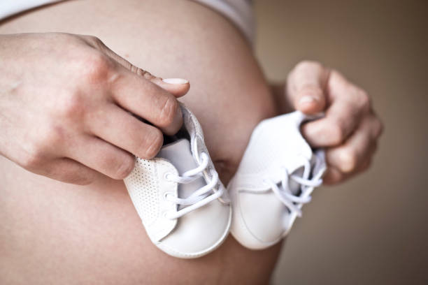 istock Pregnant woman close-up 669257492