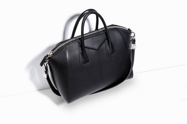 istock Black leather bag isolated on white background 669261036
