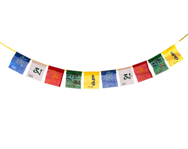 Buddhist prayer flag In the Tibetan Himalayas where they are hung on the mountain passes and mountain peaks for the wind to recite the mantras printed on them. tibet culture stock pictures, royalty-free photos & images