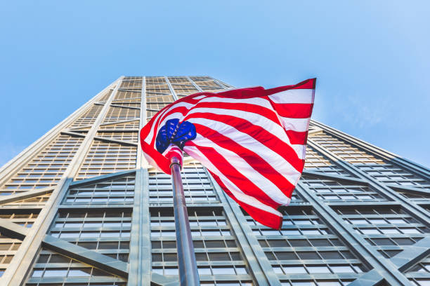 istock American flag with modern skyscraper on background 669270426