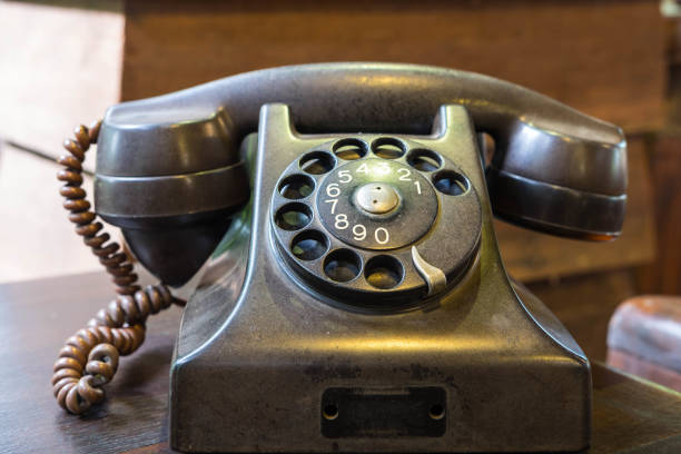 istock Old telephone on wooden desk 669272824