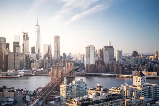 Photo of Skyline New York City Manhattan and Brooklyn Bridge At Sunset