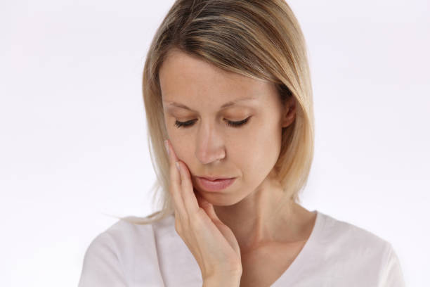 istock Beautiful Woman Suffering From Toothache. Teeth Pain 669293838