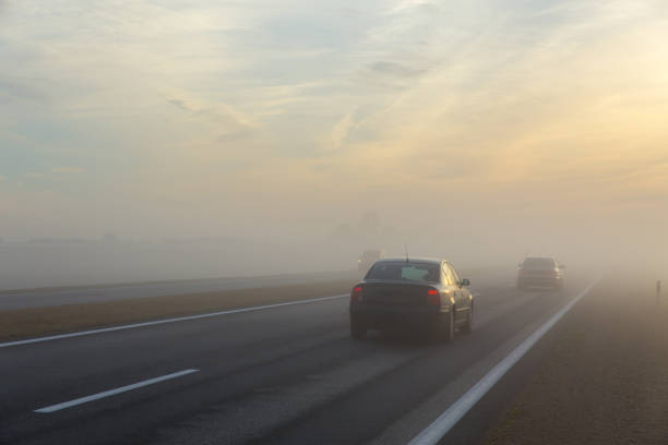 istock Freeway and a car in fog 669302476