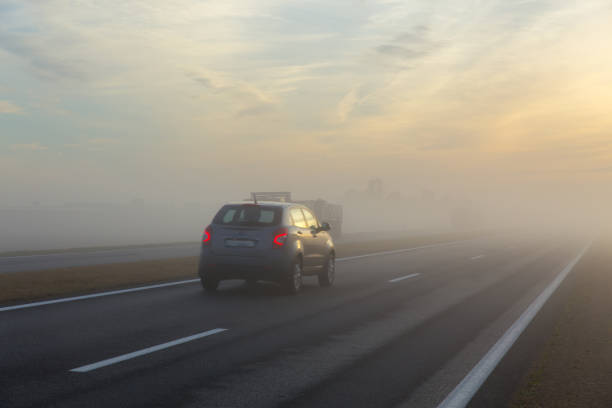 istock Freeway and a car in fog 669302486