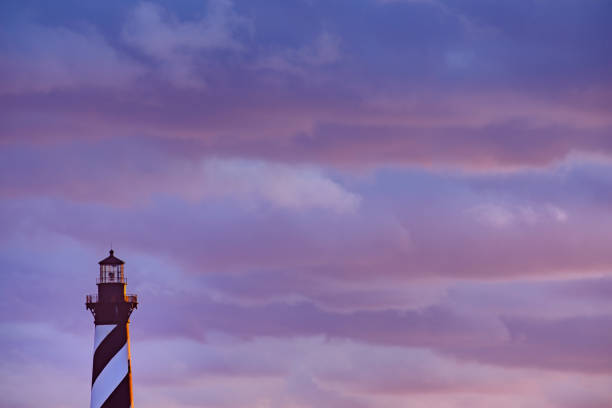 Sunset and spectacular colorful clouds on the gorgeous Cape hatteras Lighthouse on the Outer Banks