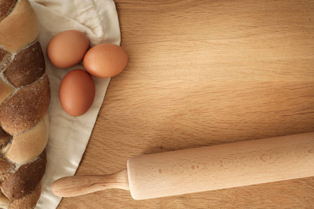 istock bread with eggs and rolling pin on a wooden table 669332798
