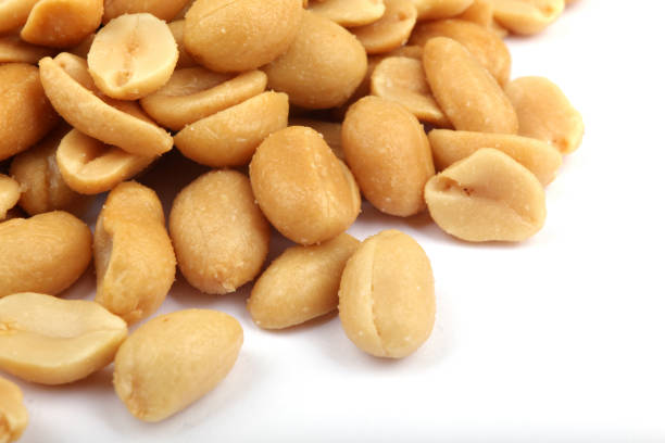 istock Close up of fried, peeled and salted peanuts 669335684