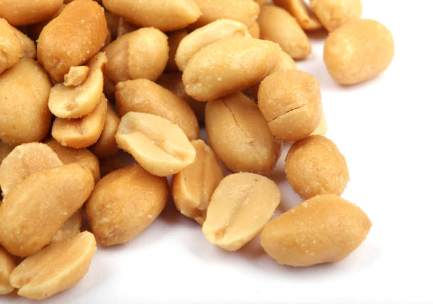 istock Close up of fried, peeled and salted peanuts 669335690