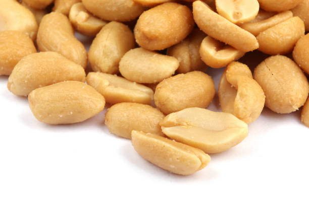 istock Close up of fried, peeled and salted peanuts 669335696