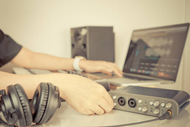 istock Musician is working on home music studio desktop 669338792