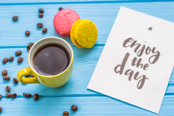 istock Stil life with macarons and coffee on the wooden background 669340108