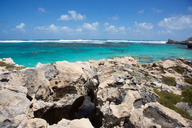 istock Natural Limestone Arch and Lagoon 669346280