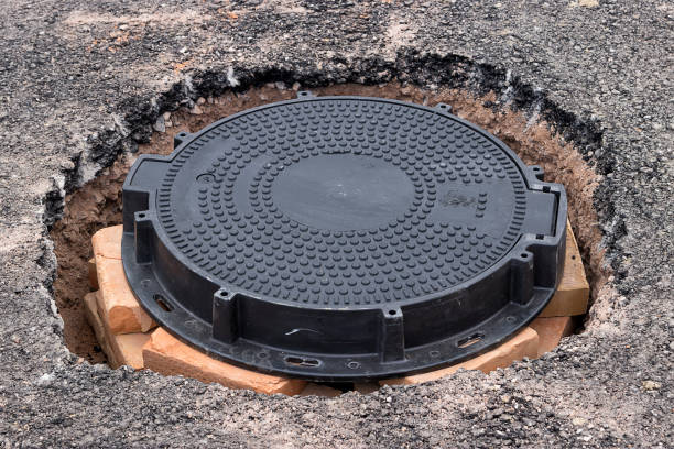 istock New round Iron manhole cover on the road 2 669346510