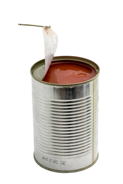istock Opened metal can with pieces of tomatoes 669349476