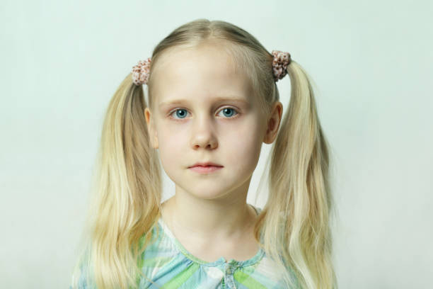 istock Young blond girl, portrait 669360150