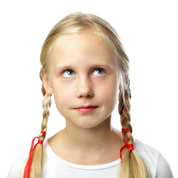 istock Cute small girl looking up 669360184