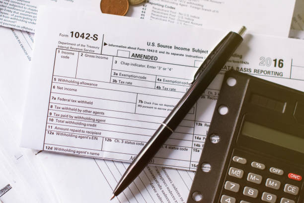 istock Tax Time Concept! Clock and Taxes Due reminder 669363634