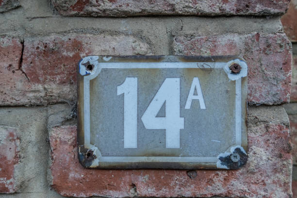 istock sign for house number 14A 669373934
