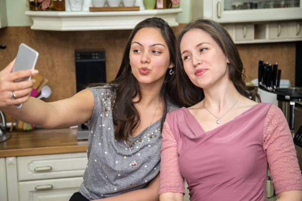 istock Happy girls taking selfie. 669377314