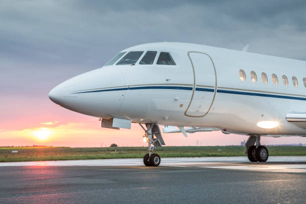 istock Private business jet ready for takeoff during sunrise 669389800